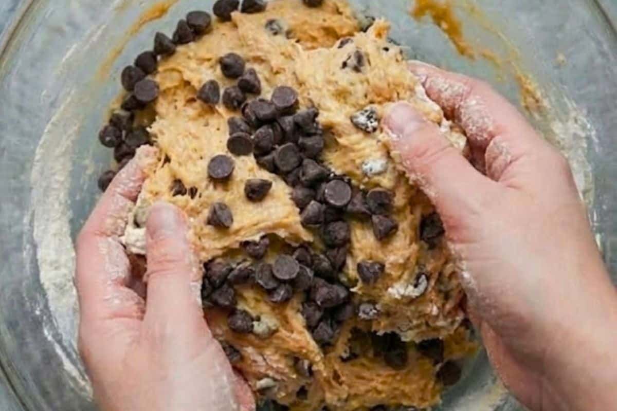 Work half of the chocolate chips into the dough using your hands 