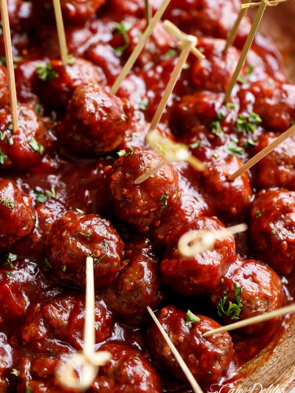 Cocktail Meatballs in Sweet and Sour Sauce pierced with toothpick for easy access