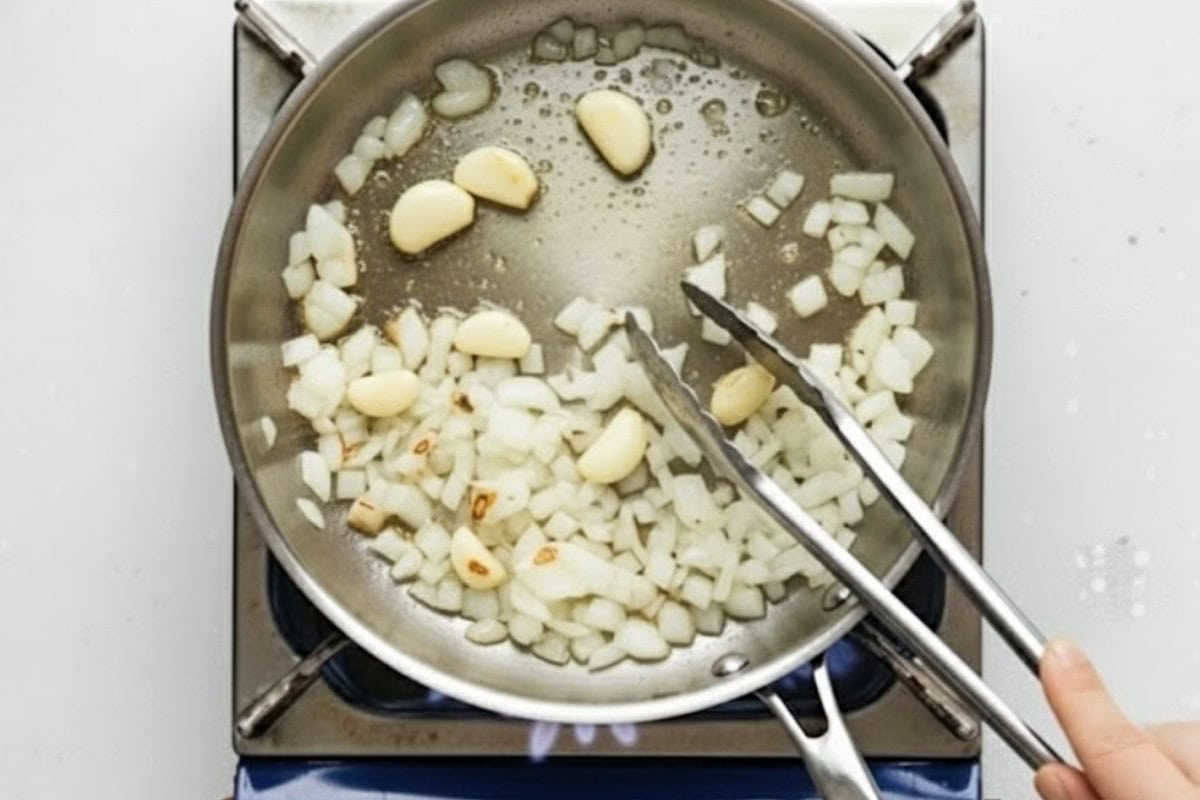 In the remaining oil-butter mixture, saute the aromatics until they soften and slightly brown.