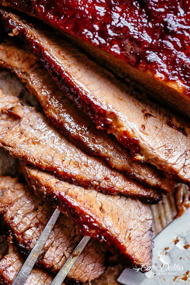 Sliced brisket #cafedelites #brisket #sliced #beef #dinner Juicy Beef Brisket slices cooked low and slow until tender, basted in a mouthwatering barbecue sauce with a kick of garlic