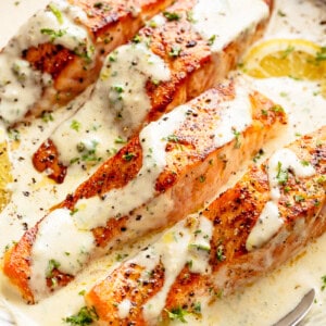 Top view of Salmon with creamy garlic sauce