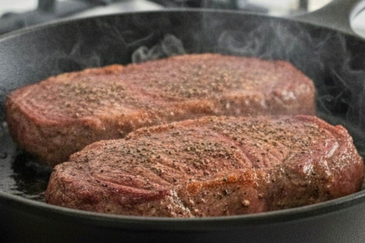 Turn the steaks and sear the second side for another 1 to 2 minutes.