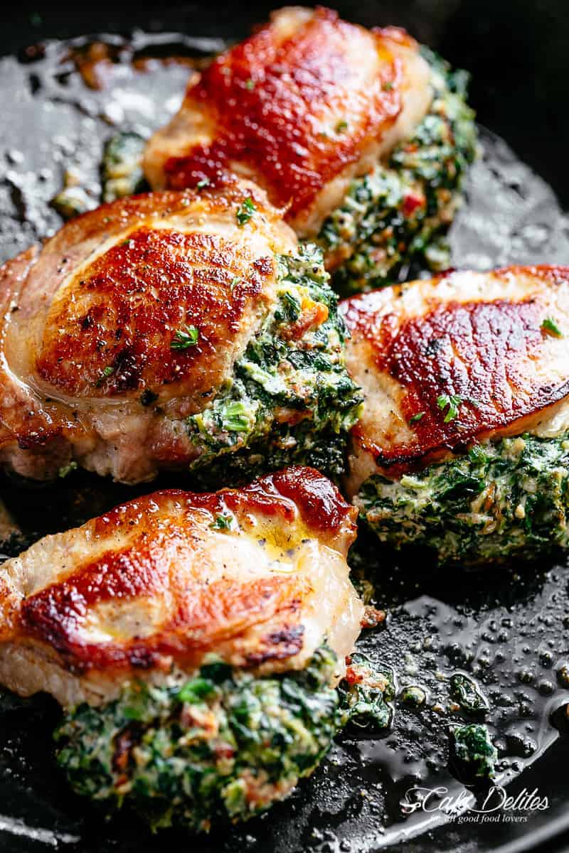 How to cook stuffed pork chops #cafedelites #stuffed #porkchops Pieces of Baked Spinach stuffed pork chops never fail to impress!