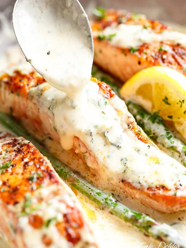 creamy Dijon sauce poured on Salmon is a deliciously foolproof recipe