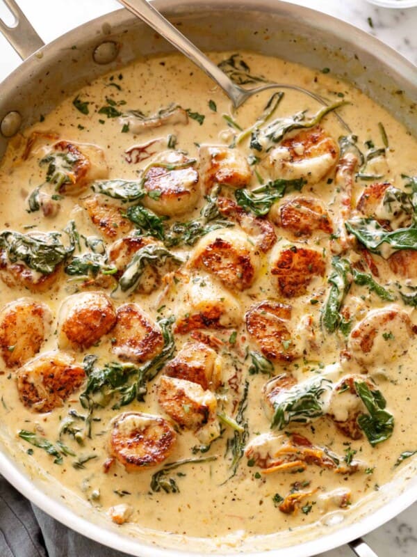 Top view of Creamy Garlic Butter Tuscan Scallops in a bowl