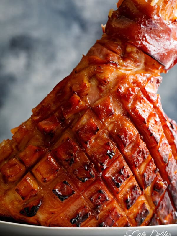Baked Maple Glazed Ham on a serving plate glazed