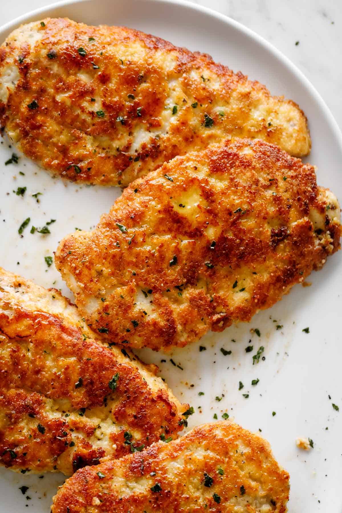 Parmesan Crusted Chicken pieces in a plate
