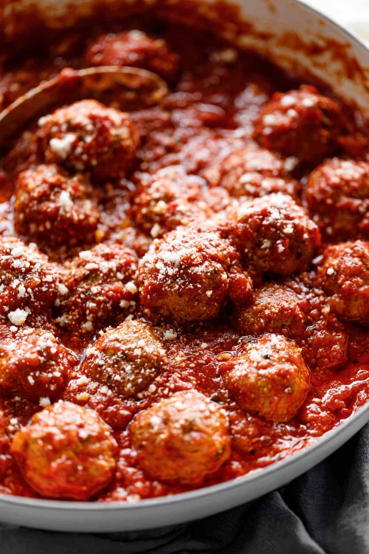 Italian Baked Meatballs in a tomato sauce #meatballs #baked #marinara #tomato #sauce Easy Baked Meatballs soaked in tomato marinara sauce