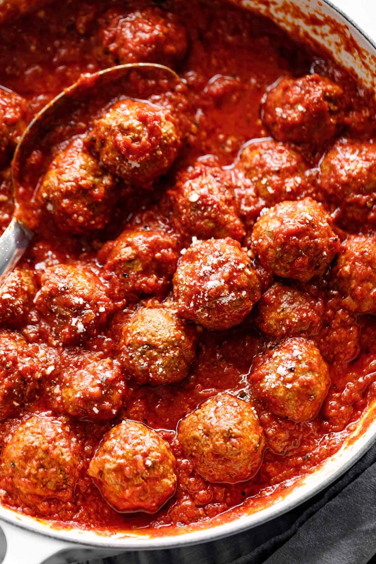 baked meatballs are easy in tomato sauce #homemade #recipe #bakedmeatballs Easy Baked Meatballs in a pan with tomato sauce