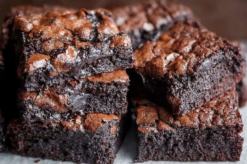 The Best, Fudgy ONE BOWL Cocoa Brownies! A special addition gives these brownies a super fudgy centre without losing that crispy, crackly top! | https://cafedelites.com