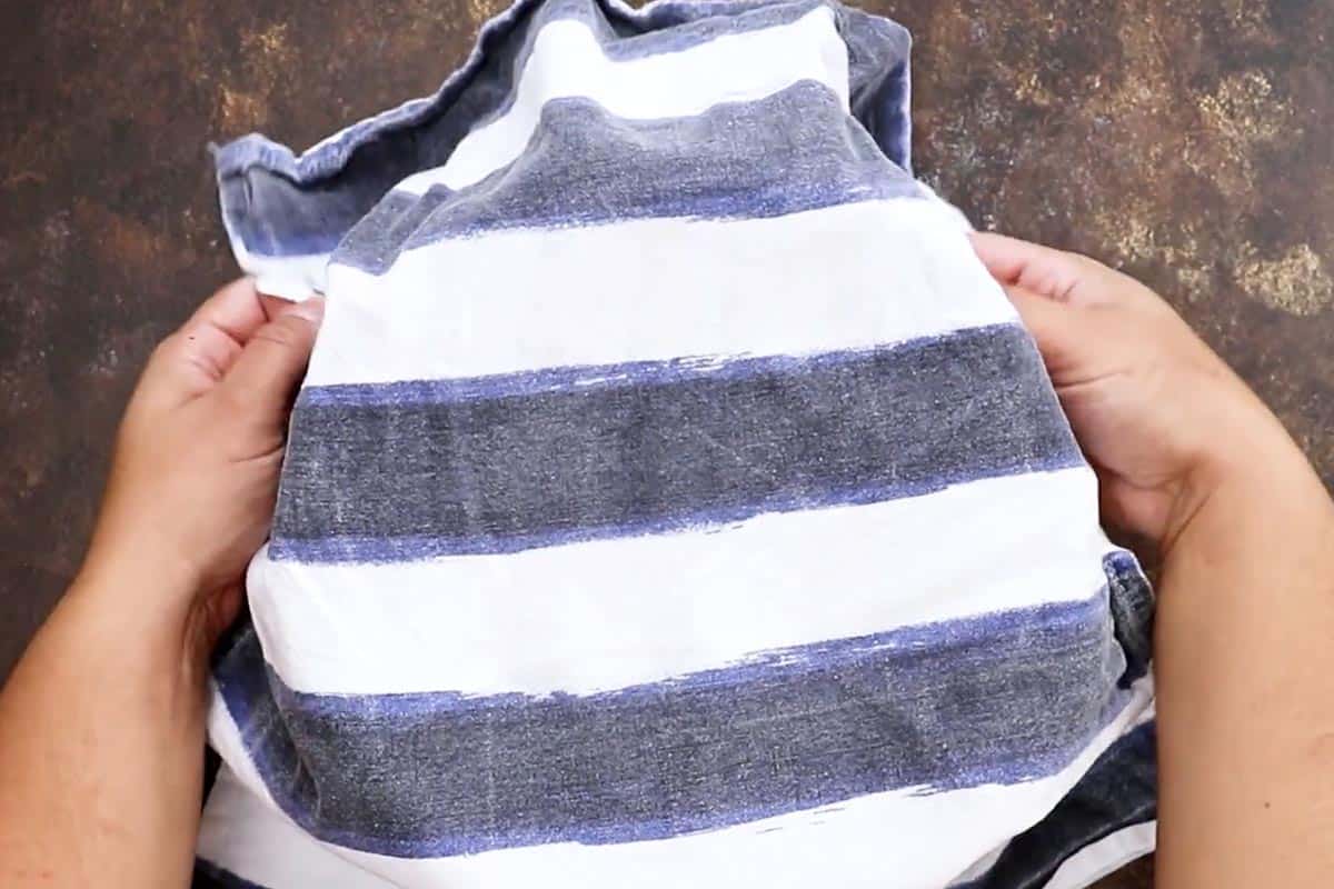 Covering the bowl with damp towel.