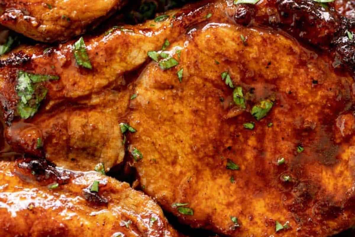 Flip once more, brush with pan juices, and broil for 1 to 3 minutes until golden and sticky. Spoon extra juices over the top, finish with cracked pepper and fresh herbs