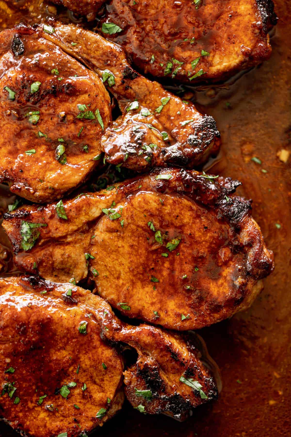 Oven Baked BBQ Pork Chops on a baking tray.