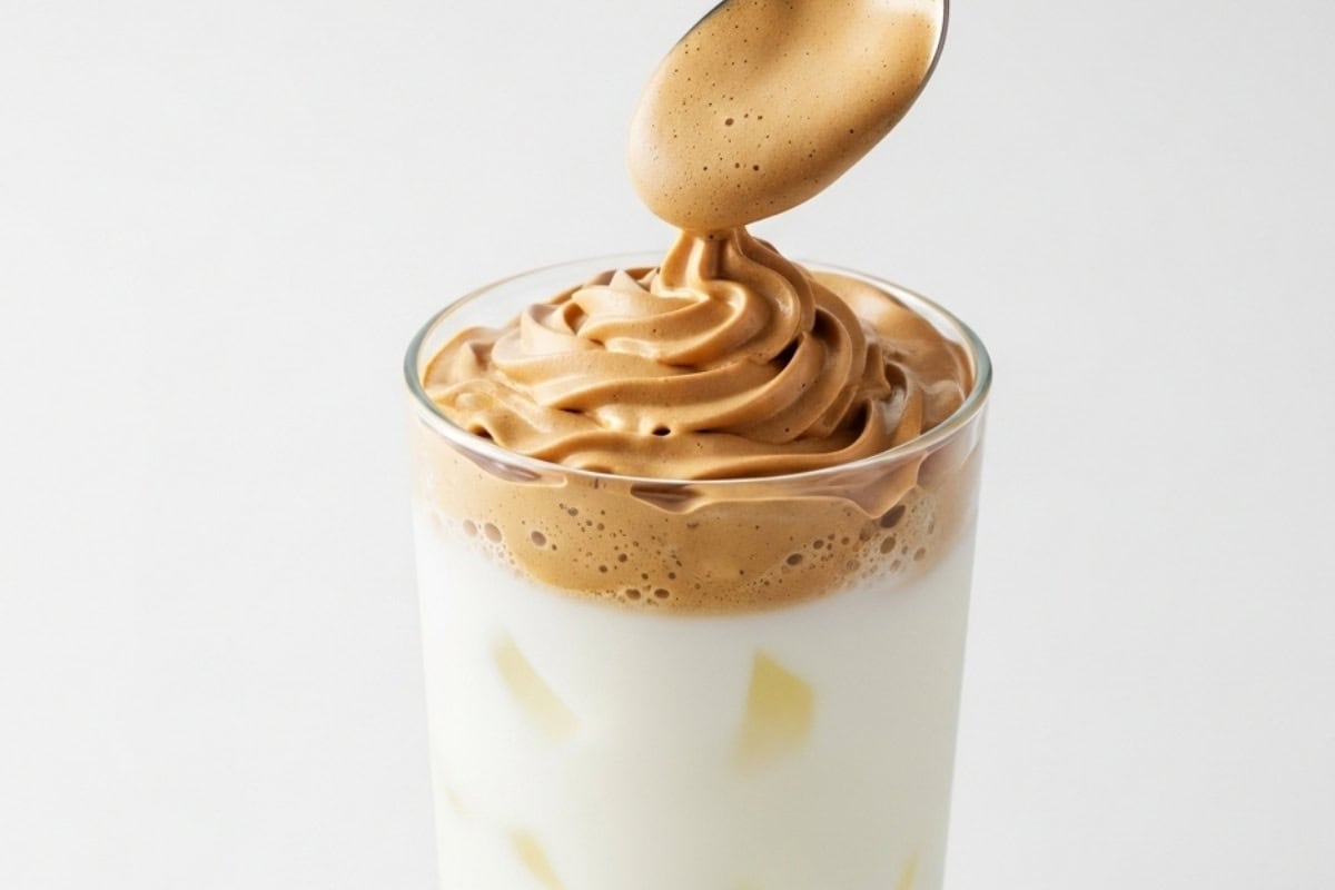 spoon the whipped coffee mixture over the milk