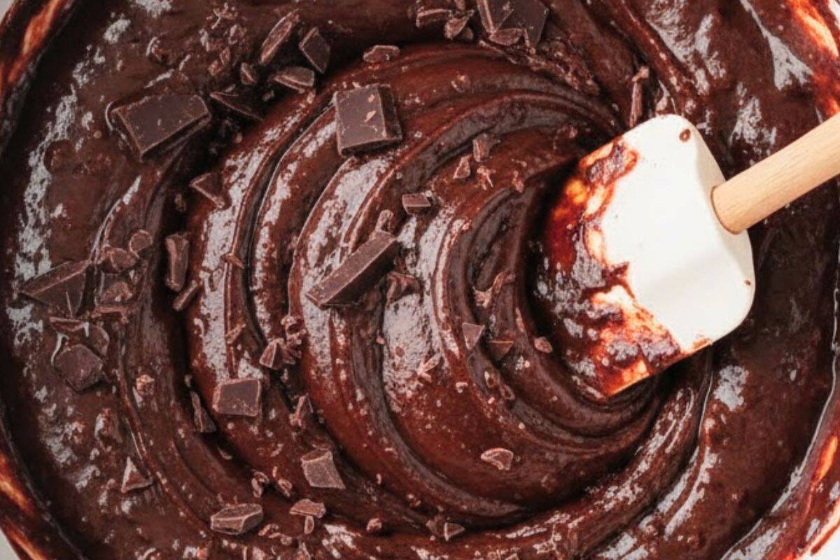 Use a spatula to fold the wet and dry ingredients together until combined.