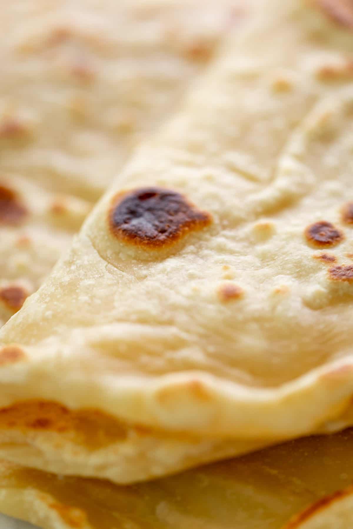 close up image of a folded flat bread.