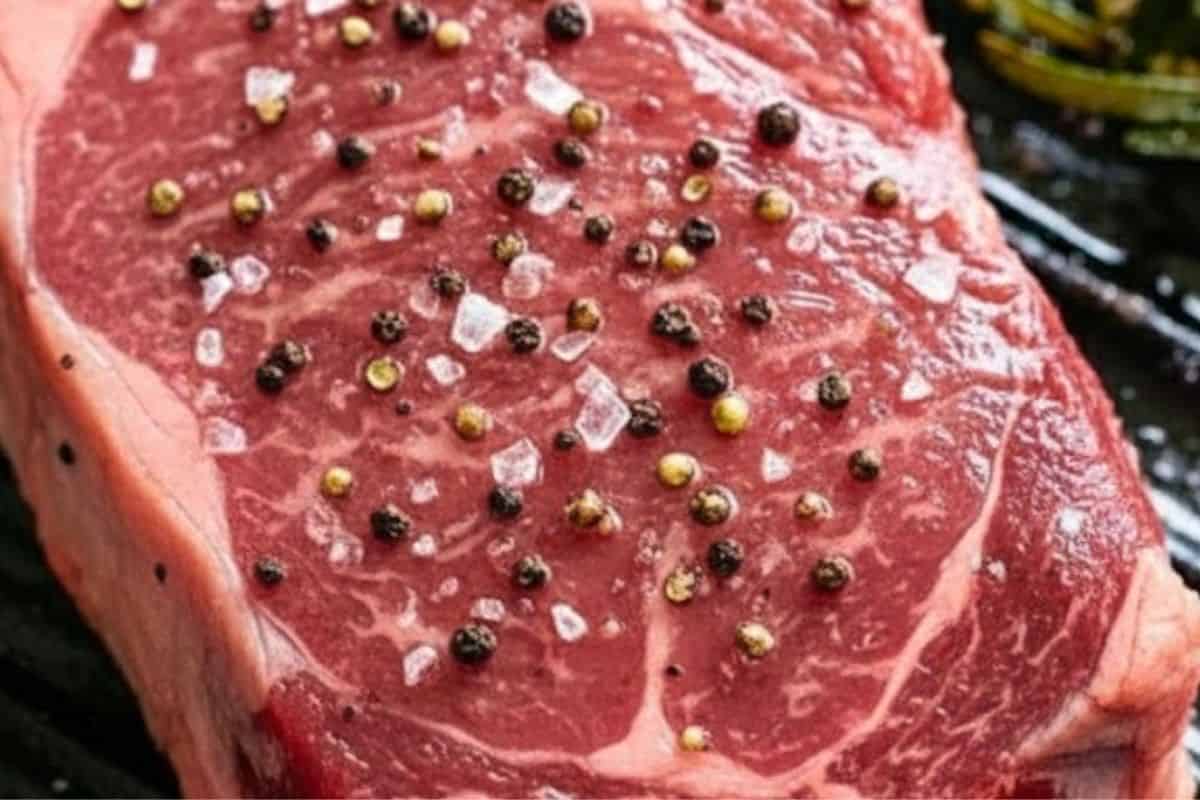 Heat grill over high and lightly grease plates with oil. Pat steaks dry, brush with oil, and season with salt and pepper.