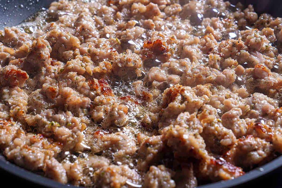 browning sausage in a skillet