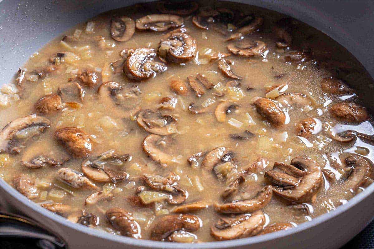 mushroom soup simmering in a pot