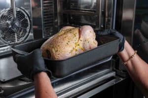 putting the chicken in the oven