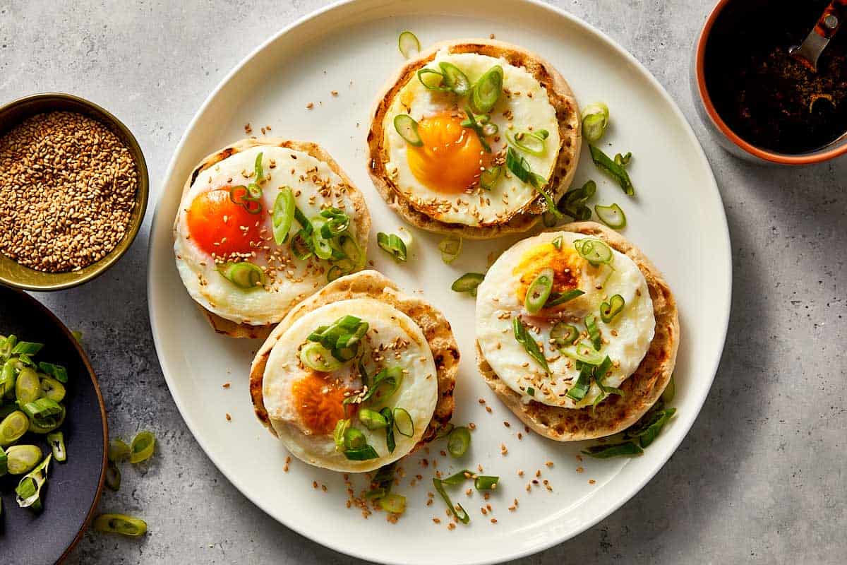 Top overview of teriyaki poached eggs garnish with green onions