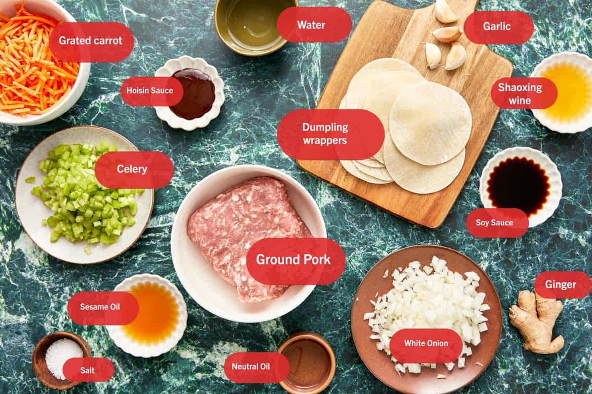 Ingredients for pork dumplings arranged neatly on a table
