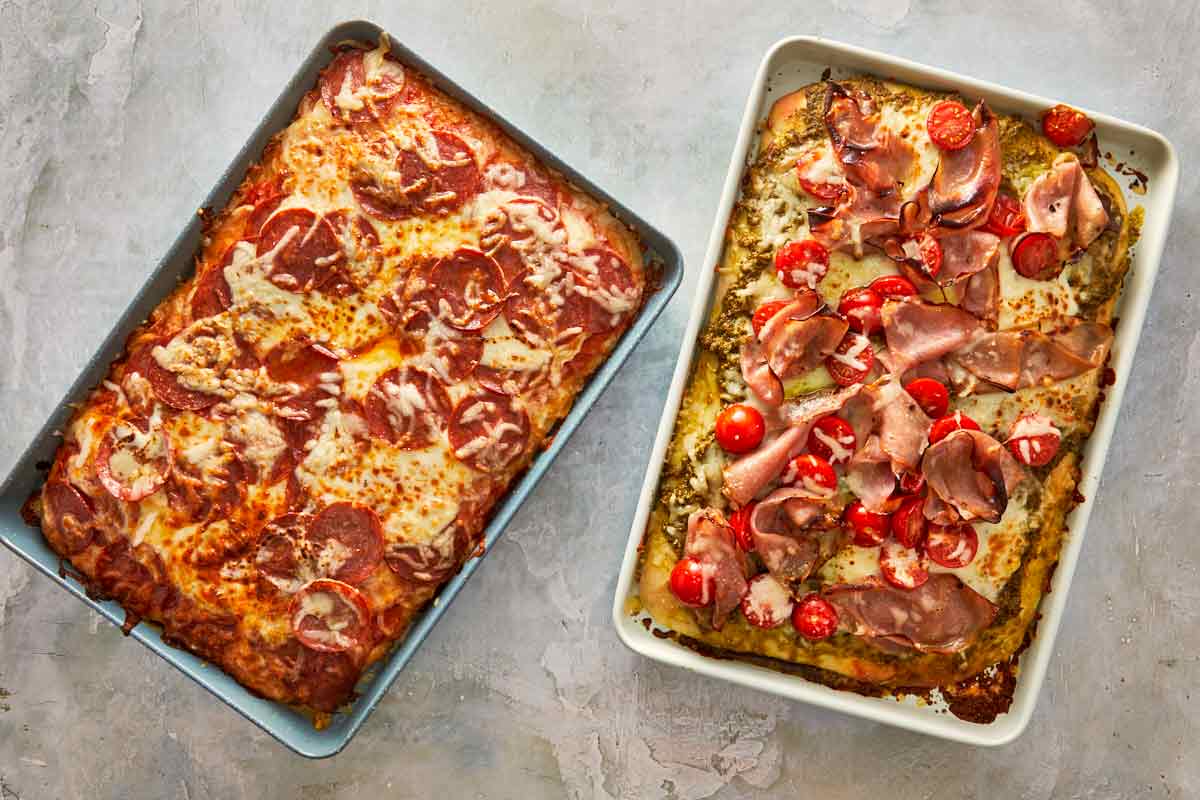 Baked focaccia pizzas fresh from the oven, golden and bubbly with melted cheese and toppings.