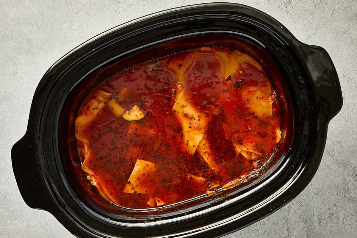 top overview of slowcooker filled with lasagna soup.