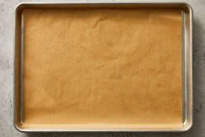 Baking sheet with parchment paper | CafeDelites.com
