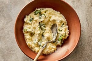 Ricotta filling mixed with basil, parmesan, and egg for cabbage lasagna.
