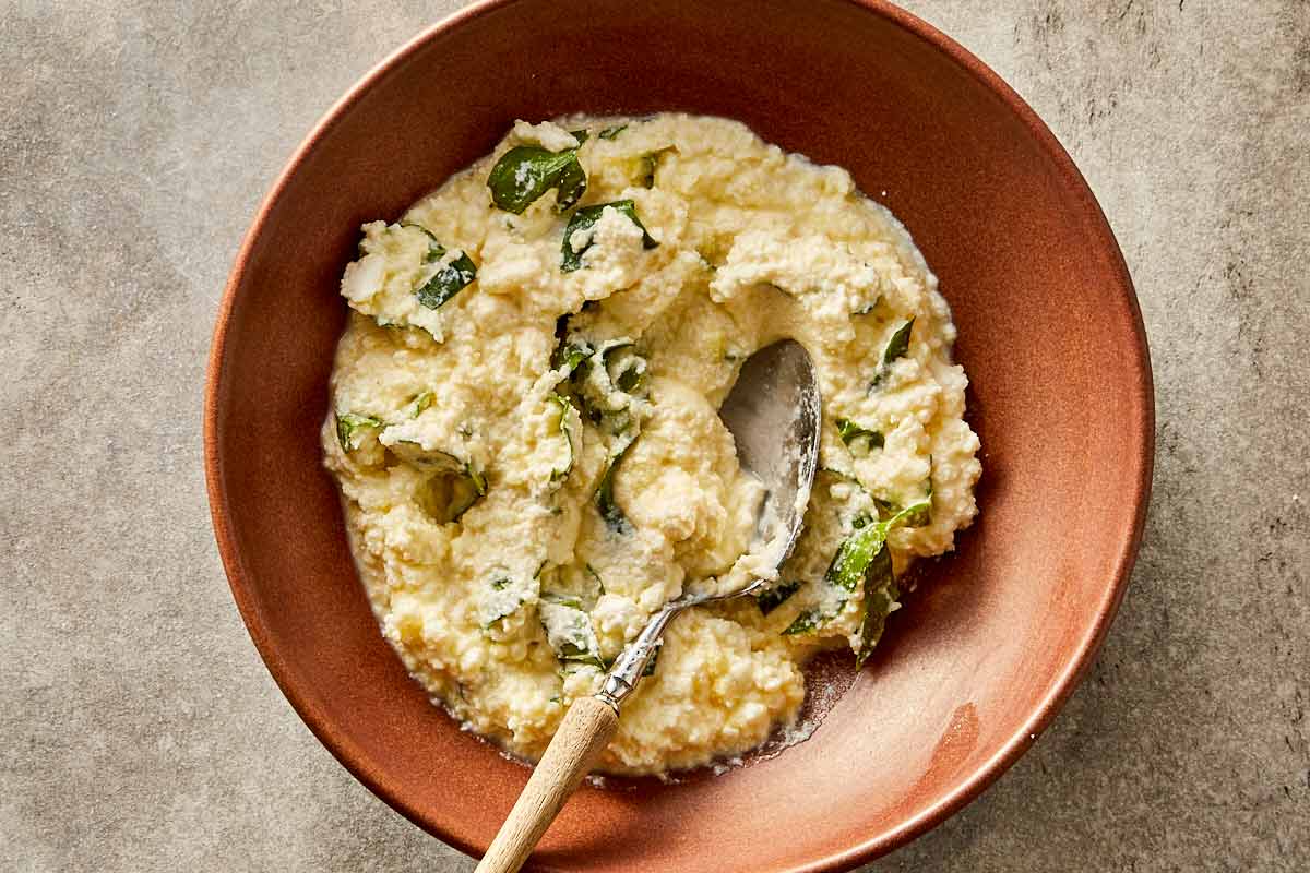 Ricotta filling mixed with basil, parmesan, and egg for cabbage lasagna.