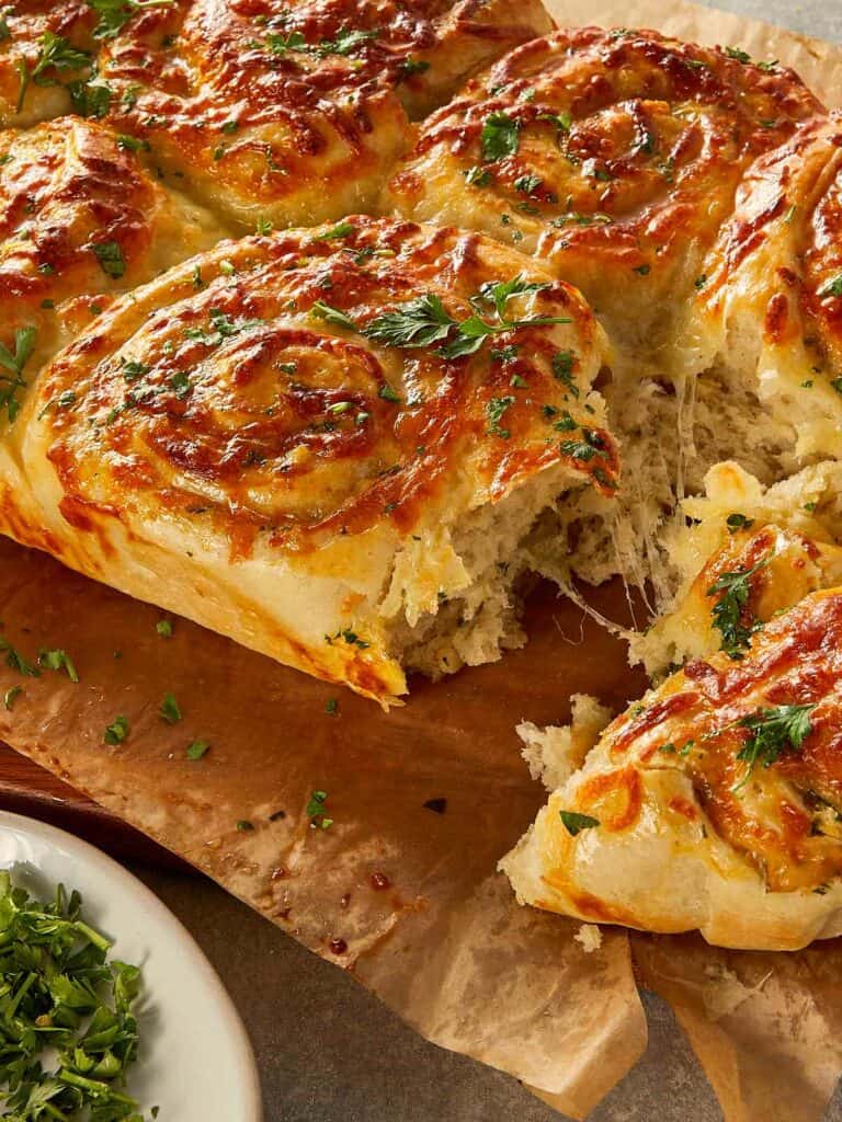 Garlic Bread Rolls being pulled