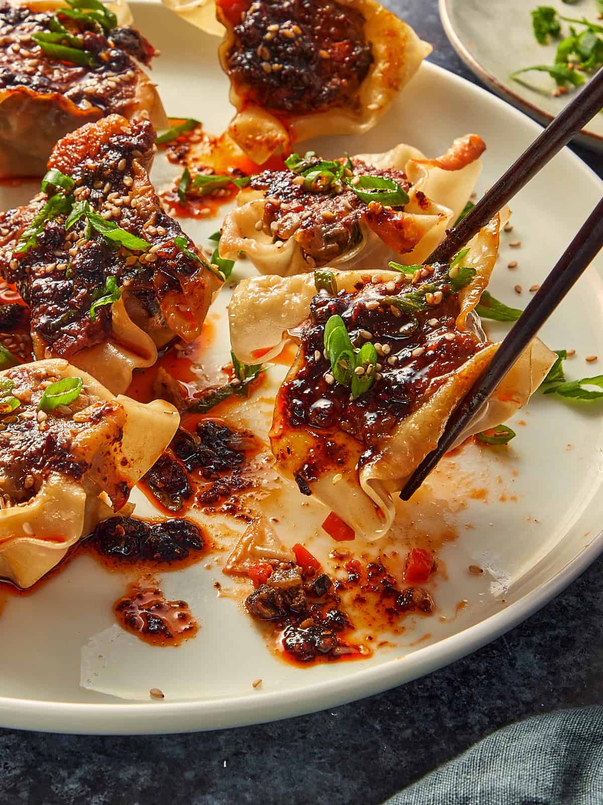 Dumpling being hold ready to eat