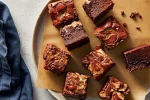 table with red velvet brownies ready to eat