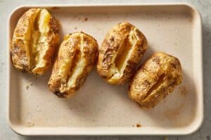 Baked Potatoes with a whole for the filling