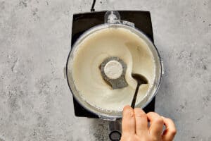 mix of feta, Greek yogurt, grated garlic, lemon juice, and olive oil in a food processor