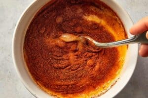 Adding paprika to the egg mix