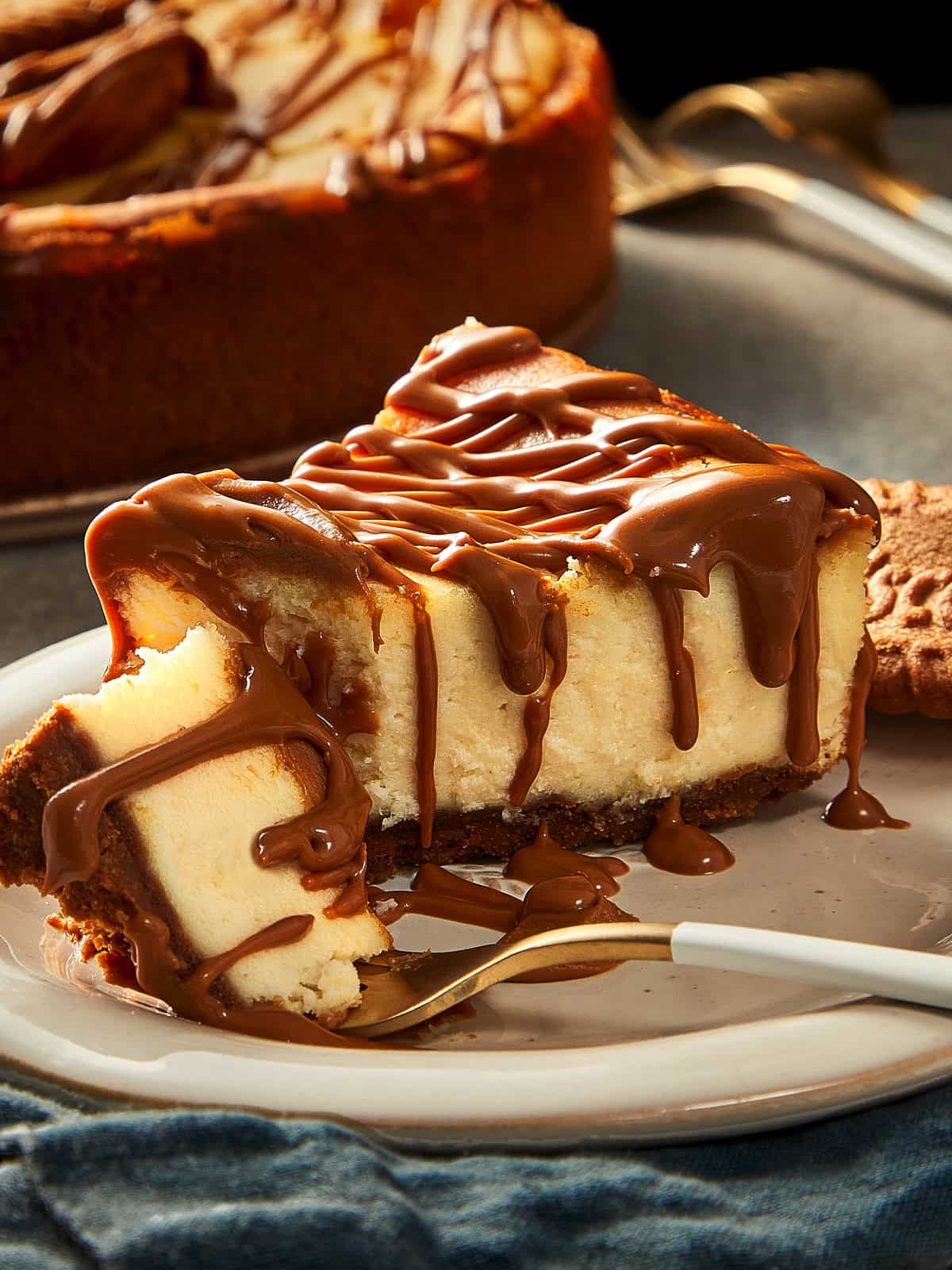 fork with a piece of cheesecake ready to eat