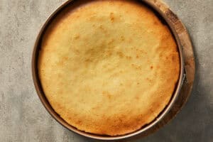 baked new york cheesecake before demolding