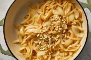 pot over medium heat, with butter, onions and garlic