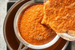 Using a strainer for the sauce