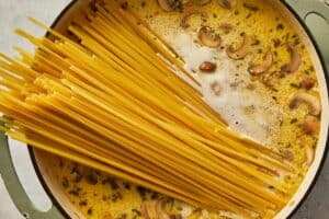 Dry pasta into the sauce about to be cooked