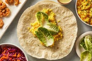 Lettuce leaves in the jumbo tortilla with rice