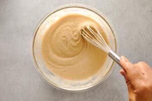 mixing the batter until fully smooth