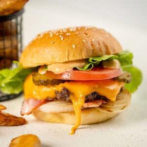 Shot of burger with potato edges